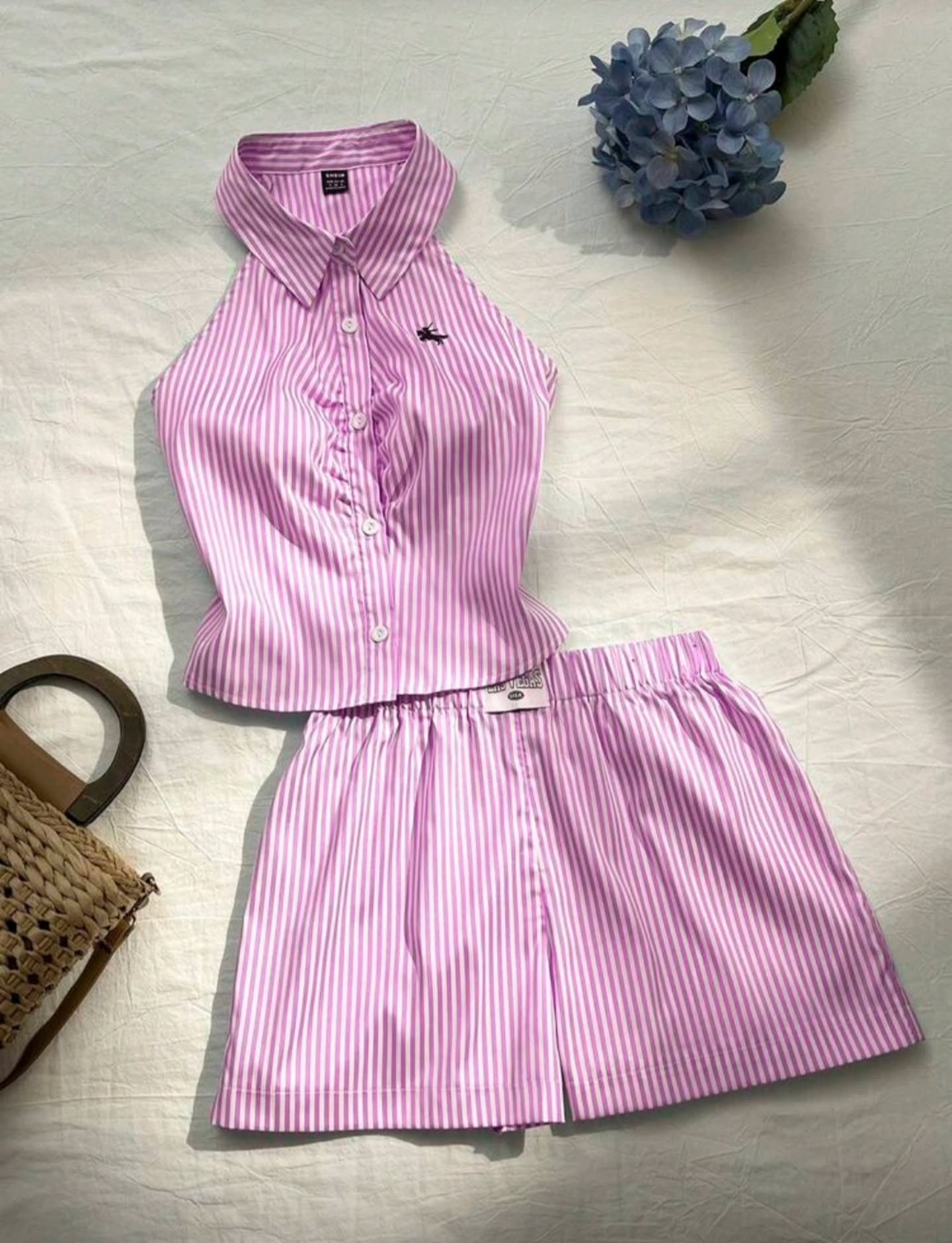 Conjunto rosado de short con rayitas estilo polo